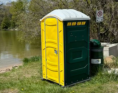 Portable toilet near a lake